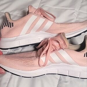 Pink Adidas tennis shoes